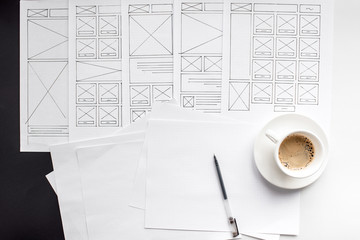 ux website designer drawing wireframe sketch of prototype, framework, layout future project. creativ