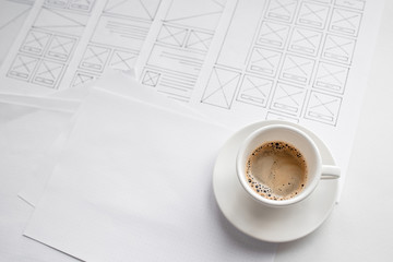 Wall Mural - ux website designer drawing wireframe sketch of prototype, framework, layout future project. creativ
