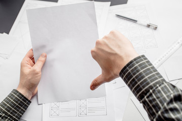 Wall Mural - ux website designer drawing wireframe sketch of prototype, framework, layout future project. creativ