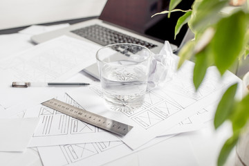 Wall Mural - ux website designer drawing wireframe sketch of prototype, framework, layout future project. creativ