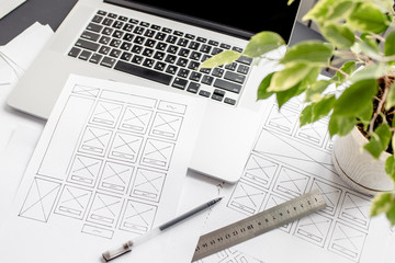 Wall Mural - ux website designer drawing wireframe sketch of prototype, framework, layout future project. creativ