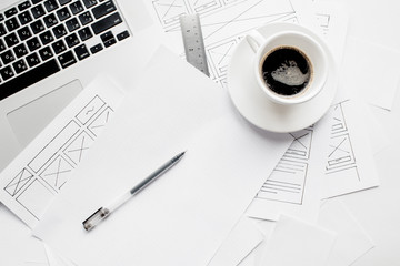 Wall Mural - ux website designer drawing wireframe sketch of prototype, framework, layout future project. creativ