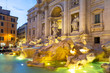 Beautiful architecture of the Trevi Fountain in Rome at dusk, Italy