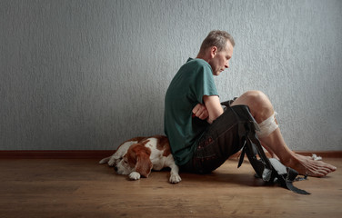  Beagle and his owner in torn pants and bitten feet.