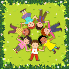 Wall Mural - Top view of kids lying on the grass in a circle