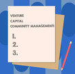 © Artur - Conceptual hand writing showing Venture Capital Community Management. Business photo showcasing Private equity capital analysisagement Stack of Different Pastel Color Construct Bond Paper Pencil