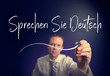 A businessman writing a Do You Speak German 