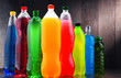 Plastic bottles of assorted carbonated soft drinks