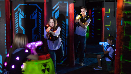 Canvas Print - Kids with parents during lasertag game