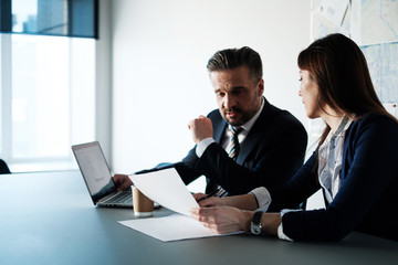 Business people talking in modern office