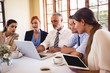 © WavebreakMediaMicro - Business people discussing over laptop at table