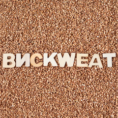 Wall Mural - Buckwheat texture with wooden word BUCKWHEAT