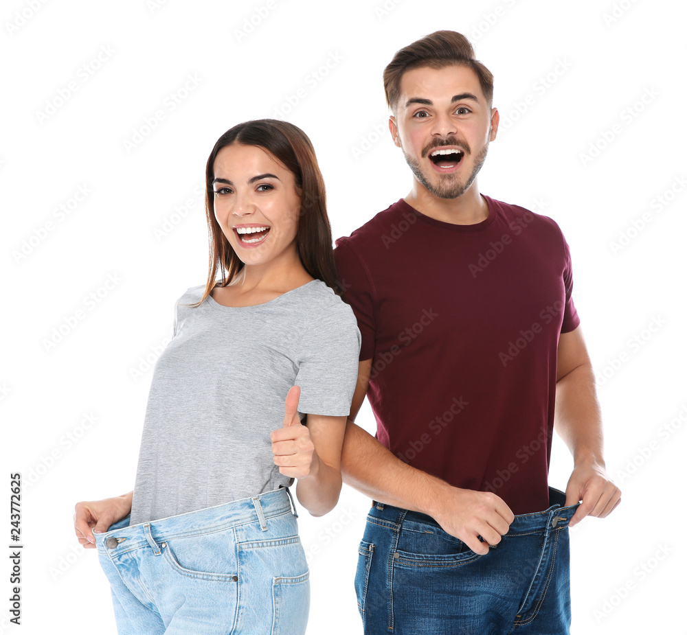 Fit Less Humans Fit people in oversized jeans on white background. Weight loss Stock ...