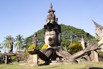 Wall Mural - Buddha Park (Wat Xieng Khuan) is a famous sculpture park with more than 200 religious statues including a huge 40-metre high.