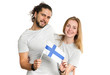 © A Stock Studio - Young beautiful couple, man and woman, with the flag of Finland in their hands isolated on white background.