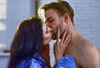Passionate kiss concept. Couple in love kissing with passion. Man and woman attractive lovers romantic kiss. Seduction and foreplay. Sensual kiss of lovely couple close up. Celebrate valentines day