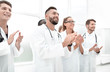 © ASDF - Doctors applaud at a conference