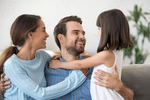 Cute Kid Daughter And Wife Embrace Dad Having Fun Together Little