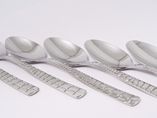 silverware forks spoons knives cutlery on a white background