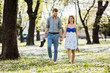© NDABCREATIVITY - Beautiful couple taking a walk in city park