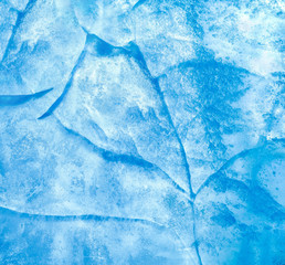 Wall Mural - abstract ice background. blue background with cracks on the ice surface