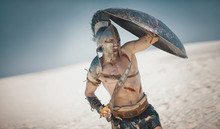 Male Athlete In The Armor Of An Ancient Warrior