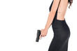 © LIGHTFIELD STUDIOS - cropped view of female killer in black dress holding gun, isolated on white
