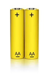 Two yellow AA Alkaline batteries, isolated on white background