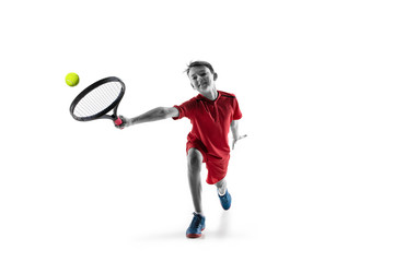 Wall Mural - Young teen boy tennis player in motion or movement isolated on white studio background. The sport, exercise, training concept