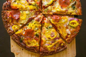 Pizza with Toppings on Wood Background, Pizza with pepperoni, banana peppers, onions