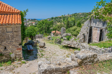 Sticker - Medieval stone fortress is located high in the mountains.