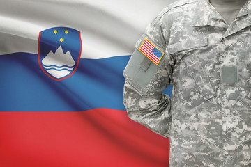 American soldier with flag on background - Slovenia