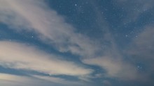 Astro Timelapse Of Starry Sky Over Arch Rock Sea Cave In Santa Cruz -Tilt Down-