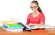 © BillionPhotos.com - Friendly Girl Sitting Behind a Desk with a Books and Using