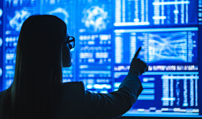 The businesswoman working with the sensor display