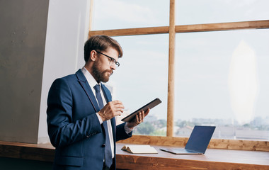 business man with tablet in the office