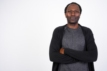 Wall Mural - African man wearing eyeglasses with arms crossed