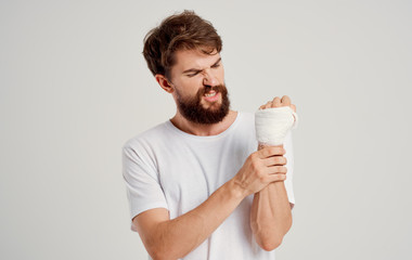 man with a beard bruised arm