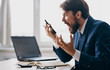 © SHOTPRIME STUDIO - business man shouting on the phone laptop