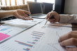 © Ngampol - Professional Business colleague team working and analyzing with new project, Idea presentation and meeting strategy plan of financial business investment
