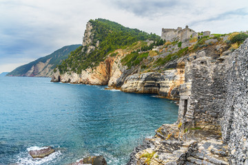 Cliff sea coast with Grotta di Lord Byron in Portovenere or Porto Venere town on Ligurian coast. Italy