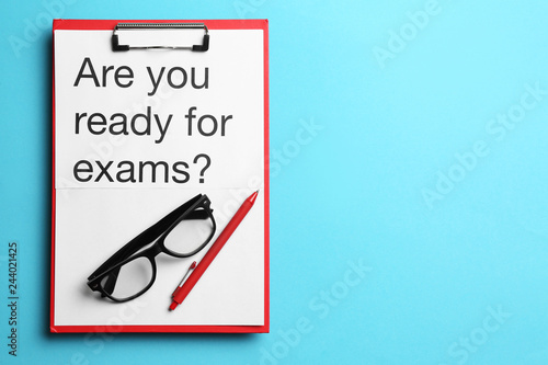 Fotografía Clipboard with text ARE YOU READY FOR EXAMS? on color background