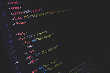 screen of developing php and html code on dark background