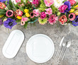 Table decoration colorful spring flowers Holidays place setting