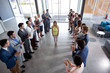 © luckybusiness - employer applauding to confident leader.
