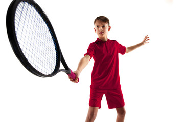 Wall Mural - Young teen boy tennis player in motion or movement isolated on white studio background. The sport, exercise, training concept