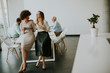 © BGStock72 - Two young businesswomen with a tablet in the office