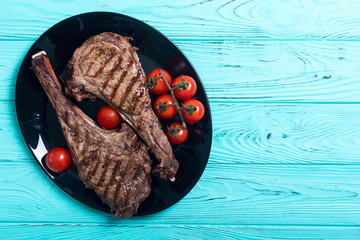 Wall Mural - Grilled beef tomahawk steak