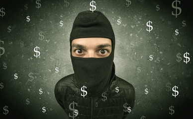 Wall Mural - Money hungry thief in black clothes and tolls on his hand.