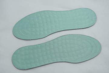 Wall Mural - green orthopedic shoe insoles 